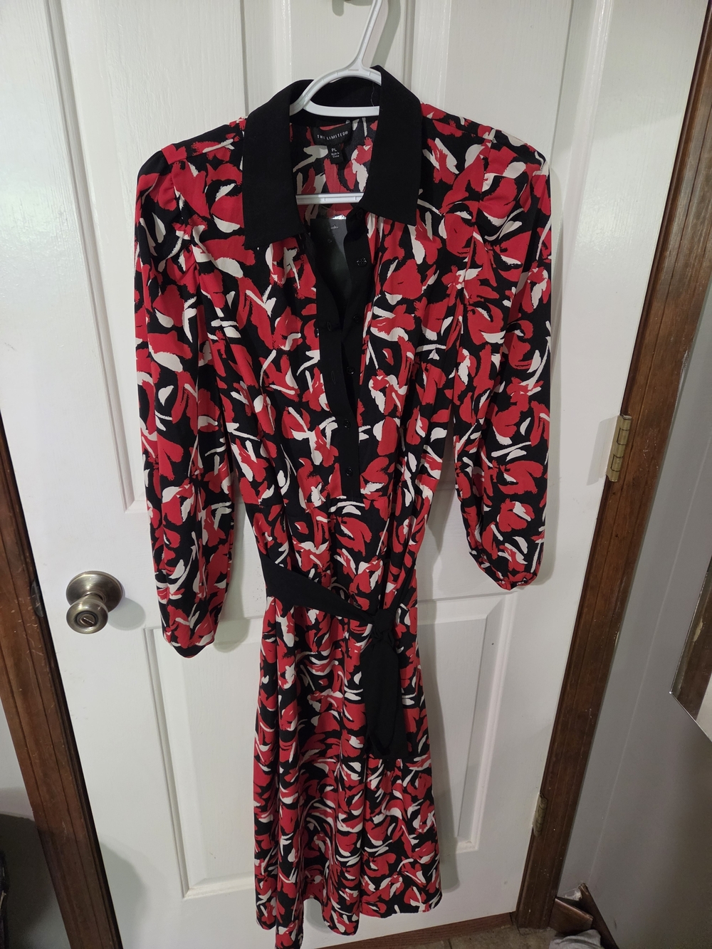 The Limited Red Floral Wrap-Style Tunic with Black Trim